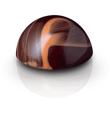 Eine Ganache aus Dunkler Schokolade, kombiniert mit Bodensee Rum und fein geraspelter Tonkabohne.